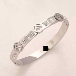 English lock finger letter L diamond-inlaid c hollow steel bracelet letter V Jewellery famous designer casual couple bracelet star with the same style 2403194