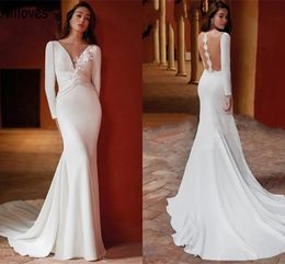 Modest V Neck Mermaid Wedding Dresses Leaf Lace Appliqued Long Sleeves Simple Satin Boho Garden Bridal Gowns See Through Back With Train Robes de Mariee YD