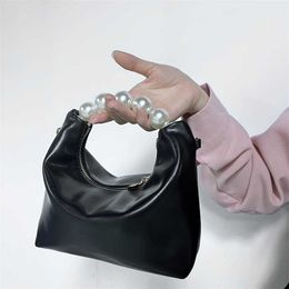 Top Shoulder Bags Women Designer Handbags Tote Bag Womens Fashion Small Versatile Pearl Handheld Chain One Crossbody Bags 240311