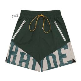 RHUDE Men Breathable Beach Shorts Men Women Casual Mesh Track Breathable Oversize Rhude Shorts Waist Drawstring Shorts Free Shipping for Black and White Shorts 7008