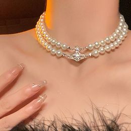 Designer Lin Zhou Collana vintage con diamanti pieni di Saturno per donna 2024 Collana con colletto di perle a doppio strato di lusso leggero primaverile