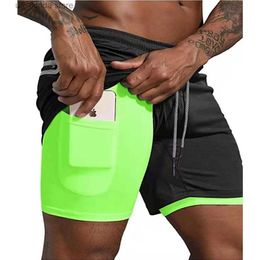 Men's Shorts New Double-layer Sports Shorts Mens Breathable Running Training Quick Drying Shorts Outdoor Fitness Basketball Quarter Pants Y240320