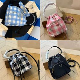 Wholesale Retail Brand Fashion Handbags Spring New Product Checker Print Handheld Nylon Waterproof Drawstring Bucket Bag Triangle One Shoulder Crossbody