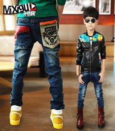 Wholepantalones 2015 new Korean children39s clothing and sports boys kids ripped black elastic waist jeans big clothes8265416