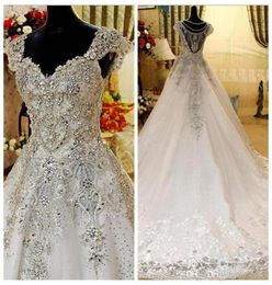 Real Pos Tulle Heavy Hand Lace A Line Women039s Wedding Dress V Neck Beading Vintage Court Train Sleeveless Bridal Gowns4337654