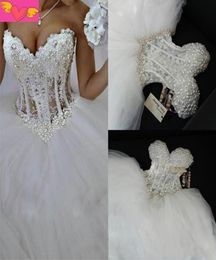 Ball Gown Wedding Dresses Sweetheart Corset See Through Floor Length Princess Bridal Gowns Beaded Lace Pearls Wedding Gowns5805949
