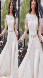 2020 Sheer Long Sleeves Lace Jumpsuits Evening Dresses Applique Beaded Pantsuit Plus Size Formal Prom Party Dresses With Over Skir5986504