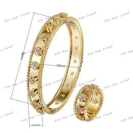 Stylish deluxe Four Leaf Clover bracelet for female Zircon Charm Bracelet Ring Jewellery Set in gold and silver