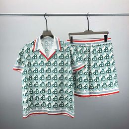 23ss Мужские дизайнерские спортивные костюмы Роскошные классические модные гавайские рубашки Спортивные костюмы шорты с принтом ананаса рубашка с коротким рукавом Костюм # 053