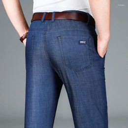 Jeans da uomo estivi sottili in Lyocell moda azzurro classico a vita alta drappeggio ampio pantaloni dritti da lavoro di marca