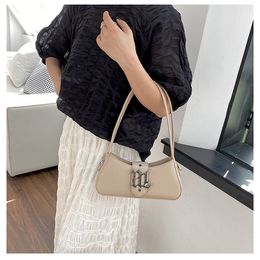 Small French minimalist women's bag 2023 new fashionable and trendy super hot single shoulder bag, solid color versatile crossbody underarm bag