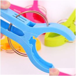 Clothing Wardrobe Storage 4Pcs Stronging Plastic Color Clips Beach Towel Clamp To Prevent The Wind Clothes Pegs Drying Ra Homefavor Dhrtq