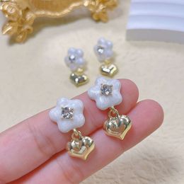 Bestselling Forest Style Sweet Dripping Oil Flower Metal Love Earrings for Women with High Grade Sense Personality Simplicity and Temperament