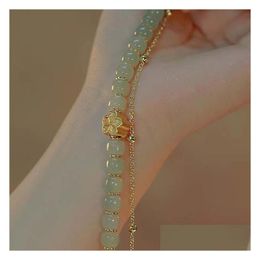 Other Fashion Accessories Zhenhetian Jade Hand String Bracelet For Women Peach Blossoms Fresh And Fashionable Qingshui Mothers Day G Ot39G