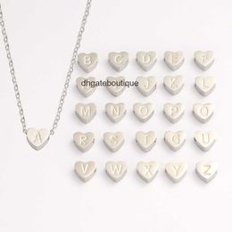 Hot selling love heart shaped corroded English letters A-Z small hole bead pendant titanium steel wind necklace