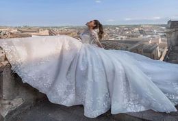 2023 Sexy Arabic Ball Gown Wedding Dresses Off Shoulder Illusion Lace Appliques Beads Long Sleeves Sweep Train Puffy Tulle Open Ba9531240