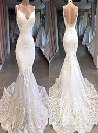 2022 Africa Style Mermaid Spaghetti Strips Wedding Gowns Slim Lace Appliques Court Train Plunging Back Bridal Dresses Garden Forma4787770