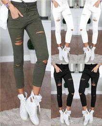 2023 New women fashion slim hole sporting Leggings Fitness leisure sporting feet sweat pants black gray navy blue hollow trousers5288581