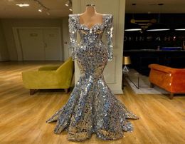 2020 New Sparkly Sequin Silver Mermaid Prom Dresses Long Sleeve Arabic Evening Dress Dubai Long Elegant Women Formal Party Gala Go7063959