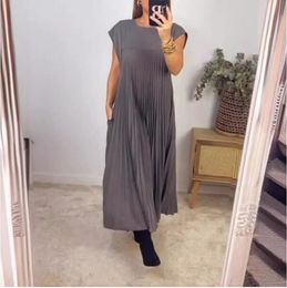 Primavera verão cor sólida o-pescoço sem mangas vestidos plissados 2024 nova moda com grandes bolsos de bainha elegante vestido longo feminino 2403211