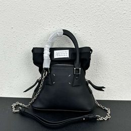 2024 New niche chain womens handbag hand-held crossbody bag trendy and versatile shell leather single shoulder womens handbag