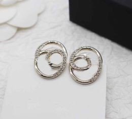 2024 Luxury quality charm oval shape stud earring with diamond in 18k gold plated have stamp box hollow design PS3266B