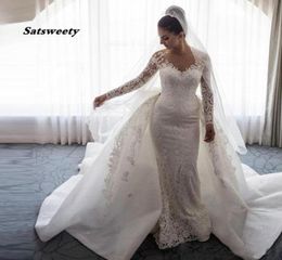 2021 Luxury Mermaid Wedding Dresses Sheer Neck Long Sleeves Illusion Full Lace Applique Bow Overskirts Button Back Chapel Train4920466