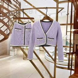 Two Piece Dress Designer Brand Purple Twisted V-neck Knitted Cardigan Diamond Buckle Wrapped Hip Skirt Fashion Set Spring New 23L7