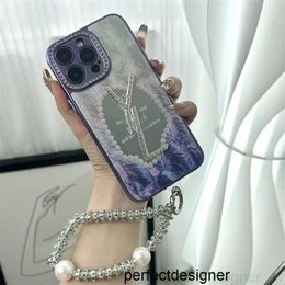 Designer Metal Phone Cases Cover Designer Diamond Mirror Phone Cases For IPhone 14 14Pro 14Plus 13 12 Luxury Brand Cover Case White With Pearl ChainMTZ0
