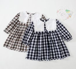 2022 Spirng Girls plaid dress preppy style kids ruffle lapel long sleeve dresses children cotton lattice clothing A83725357683