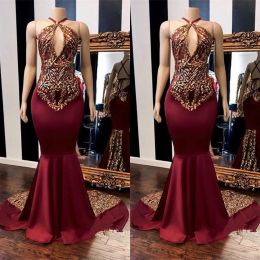 2024 Burgundy Halter Mermaid Prom Dresses Gold Sequined Bandage Evening Gowns Plus Size Special Occasion Dubai Arabic Party Dress