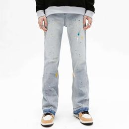 Jeans micro svasati stile americano High Street per pantaloni da uomo elasticizzati slim fit primavera e autunno con fori, pantaloni lunghi da mucca alla moda micro svasati