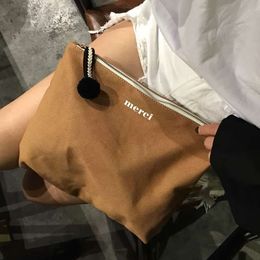 South Korea dongdamen style versatile simple letter canvas bag small hair ball Merci Hand Bag Makeup Bag letter