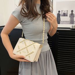 Designer Luxury fashion Shoulder bags French fresh and fashionable womens bag popular on the internet in 2023 Same style chain cross diamond grid design single shoul