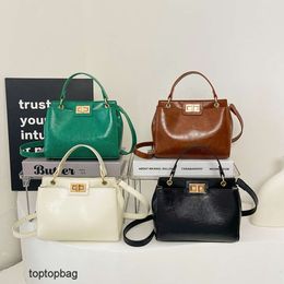 Designer Luxury fashion Shoulder bags Handheld Solid Colour Womens Bag 2024 New Fashion Versatile Elegance Single Shoulder Crossbody Womens Bag
