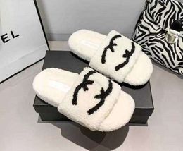 Slippers Woolskin Sheepskin Insole Slides Sandals Flat Slipper Designers Women Soft Winter Luxury Plush Fur Oran Rubber Sole Fashion Shoes L230520555