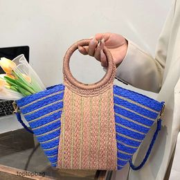 Designer Luxury fashion Tote bags Trendy Handheld Vacation Grass Woven Tote Bag 2024 New Versatile Fresh One Shoulder Crossbody Womens Bag