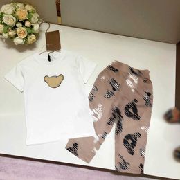 Luxury kids designer clothes baby tracksuits Size 100-160 CM Summer two-piece set Bear face pattern print boys T-shirt and pants 24Mar