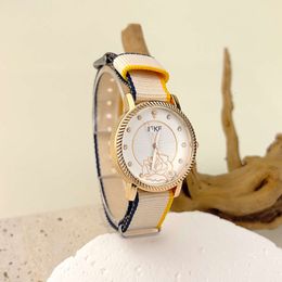 Small and Luxury Women's Nylon Cloth Strap New Quartz Watch