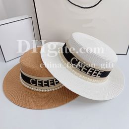 Ladies Summer Hat Designer Bucket Hat Letter Flat Top Straw Hat Travel Vacation Sun Hats Pearl Grass Hat Beach Sunscreen Hat