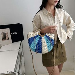 Designer Luxury fashion Tote bags Vacation Fashion Womens Bag 2024 New Beach Bag Single Shoulder Crossbody Grass Woven Womens Bag