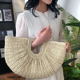 Designer Luxury fashion Tote bags 2024 New Beach Grass Woven Bag Sweet and Fashionable Popular on the Internet Same Style Wrist Bag