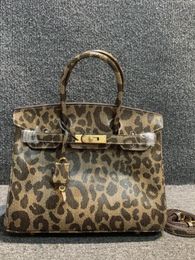 Genuine leather bag Korean style dinner versatile fashionable leopard print cowhide handheld shoulder lock platinum bag