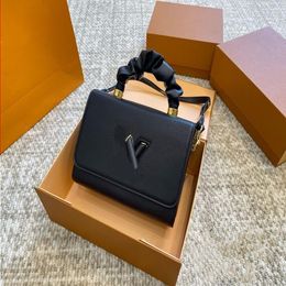 24SS Women's Luxury Designer TWIST Backpack Tote Bag Understated Luxury Daily Commute 23cm Mkpmv