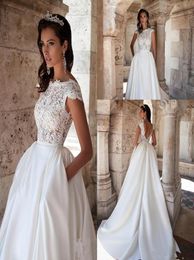 2019 Lace Charming Wedding Dresses Cap Sleeves Satin Backless Bridal Dresses with Pocket Vestidos Plus Size Cheap Wedding Party Go7186872