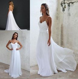 Simple Summer Beach Wedding Dresses Chiffon A Line Applique Lace And Chiffon Bridal Gowns Sexy Open Back Long White Skirts 20174989555