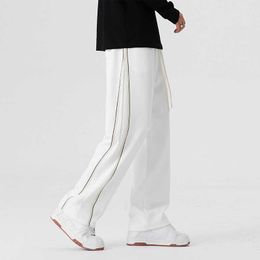 Pantaloni sanitari casual a righe da strada americana High Street Design alla moda da uomo Gamba dritta Sport Drappeggio ampio Versatile Ampio
