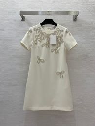 2024 Spring Black / Ivory Solid Color Bow Beading Dress Short Sleeve Round Neck Rhinestone Short Casual Dresses B4M242078