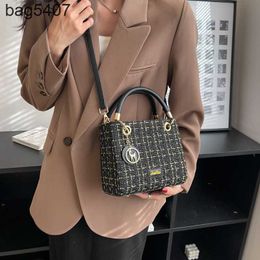 Handbag Manufacturers Online Wholesale and Retail Womens Bag New Simple Fashionable Small Fragrant Wind Woollen Handheld Crossbody Wearing High End Feeling