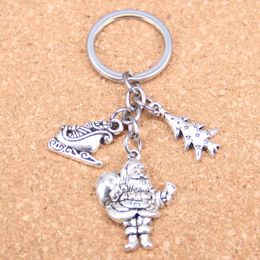 Keychains 20pcs Fashion DIY Keychain Christmas Santa Claus Pendants Men Jewellery Car Key Chain Souvenir For Gift